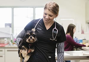 st-paul-pet-hospital-jennifer-holding-dog st-paul-pet-hospital-jennifer-holding-dog
